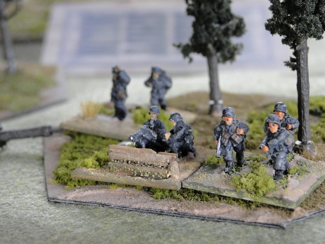 Soviet machine gunners in the open, too good a target, the machine gun bursts into life