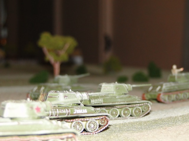 The platoon Big Man signals the advance