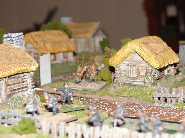 Soviet infantry break into the village