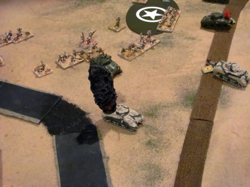 The 88's initial volley knocks out one tank, immobilises another, and knocks out the main gun of a third. Time for some artillery!