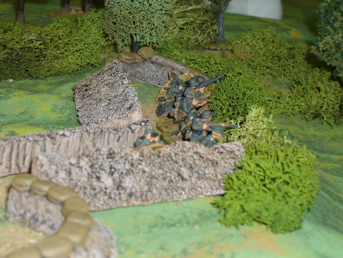 A German squad opens fire.