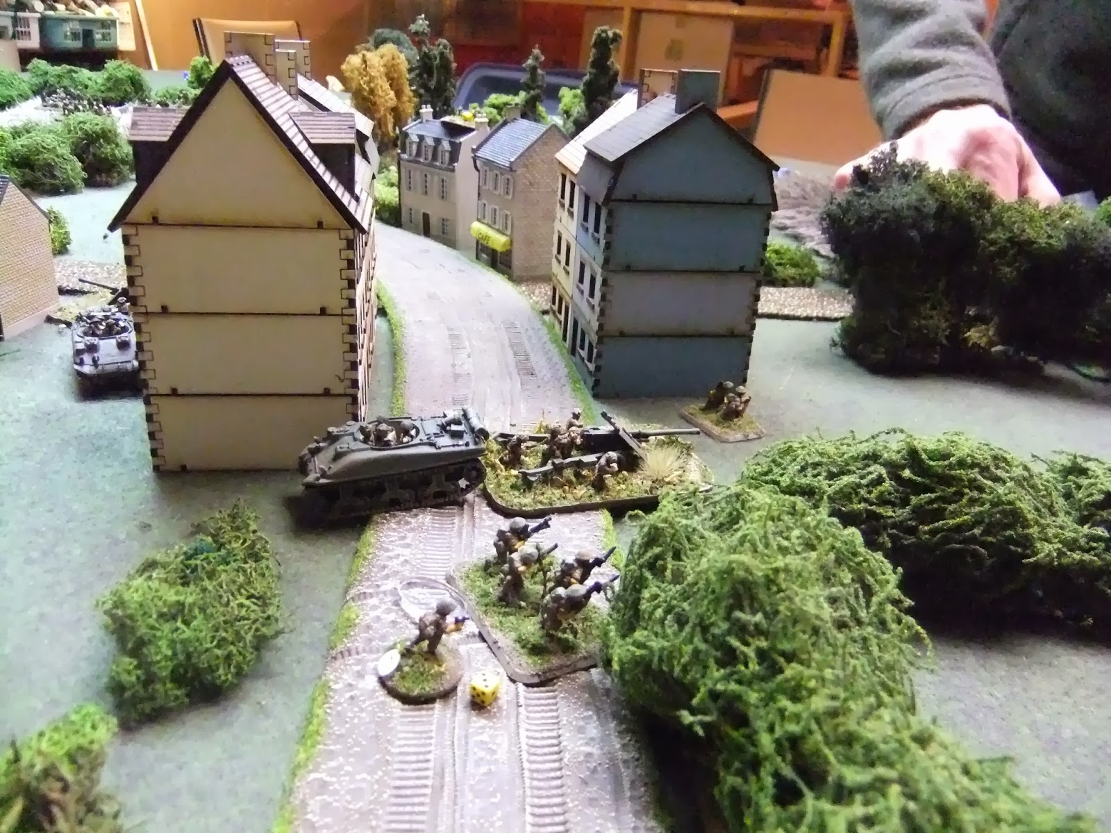 Lt. Franklin and what's left of his section take cover behind the hedge