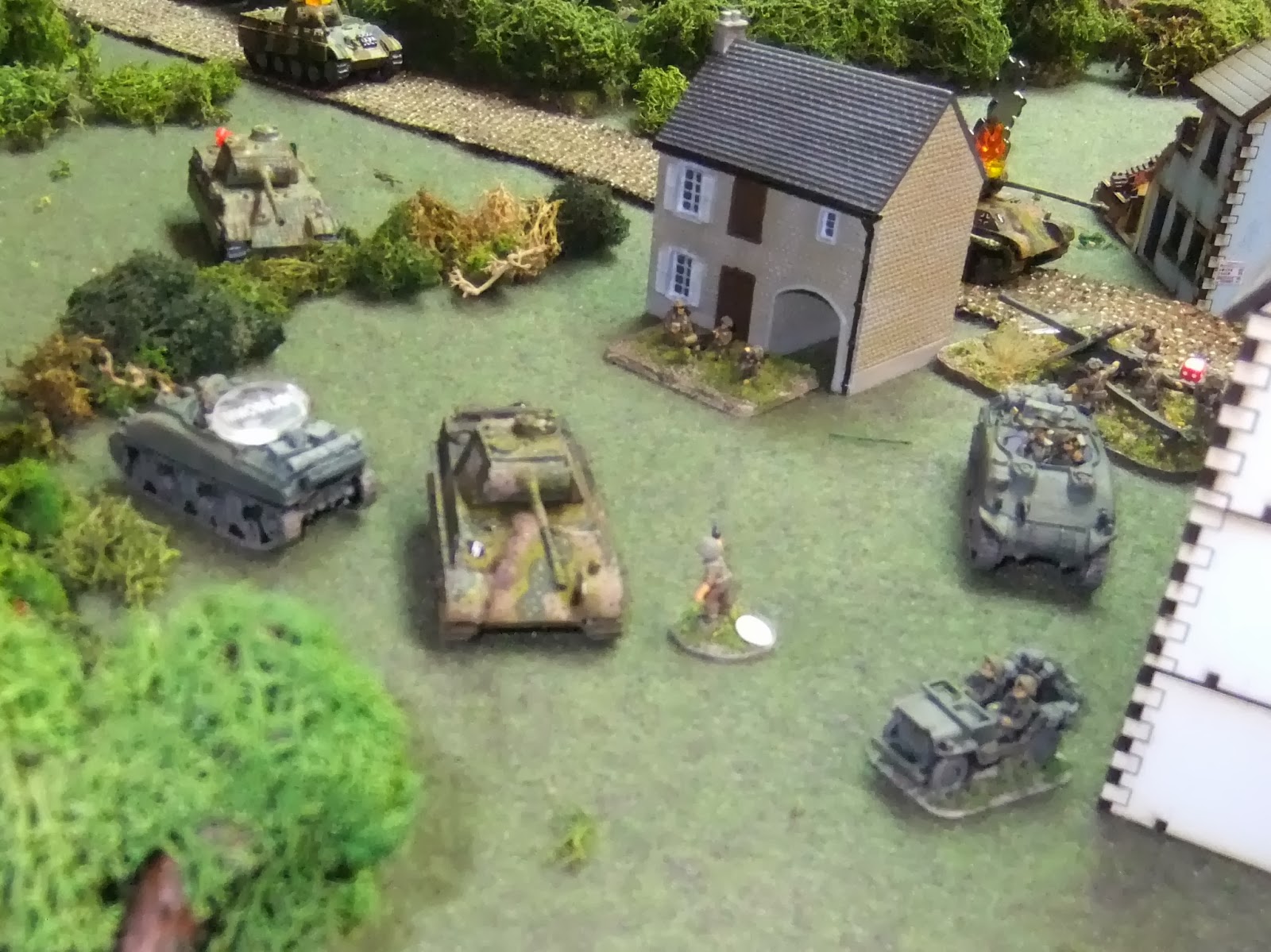 Maj Fraser uses the "Heroic Leader" card. 