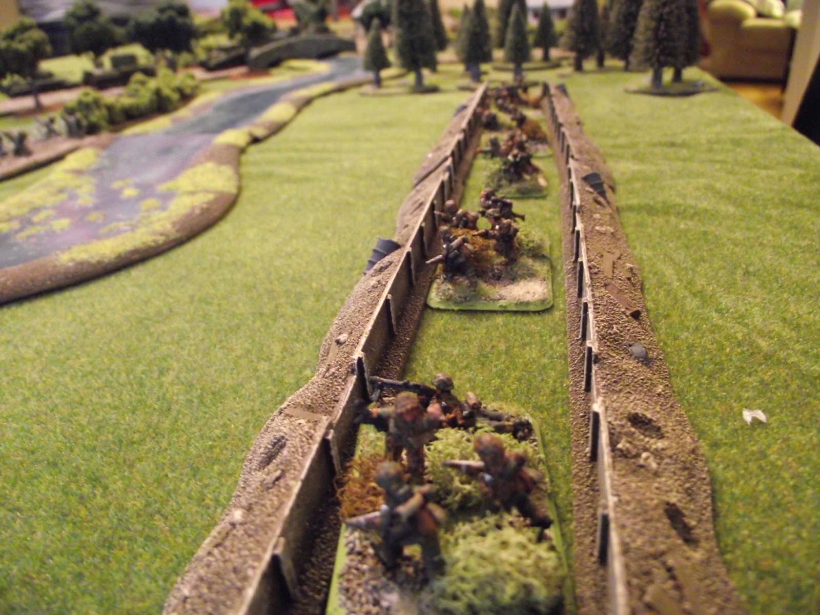  German platoon one in a trench line to the left of the junction and defending a ford that would give the allies another crossing point. The ford also has some barbed wire to its front. 