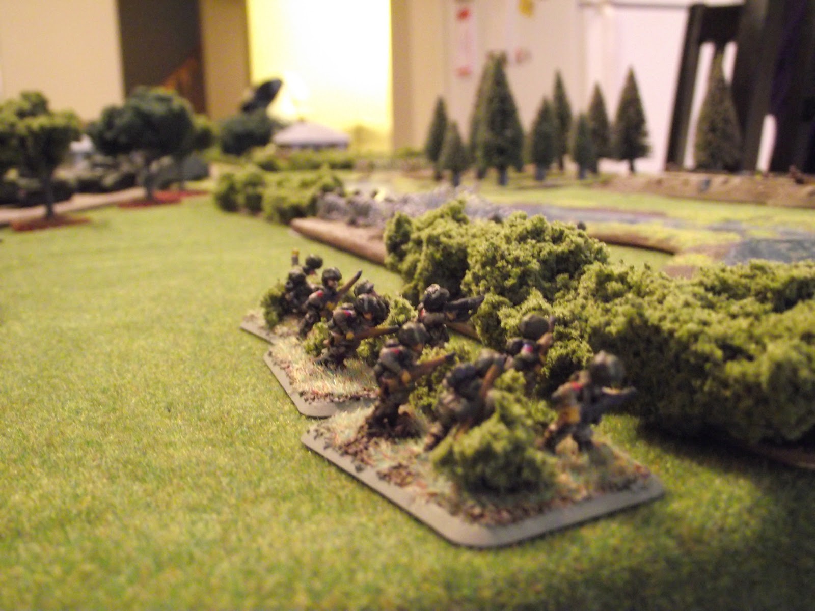  US Paratroops move up to lay some fire down on the Germans across the river in the trench. 