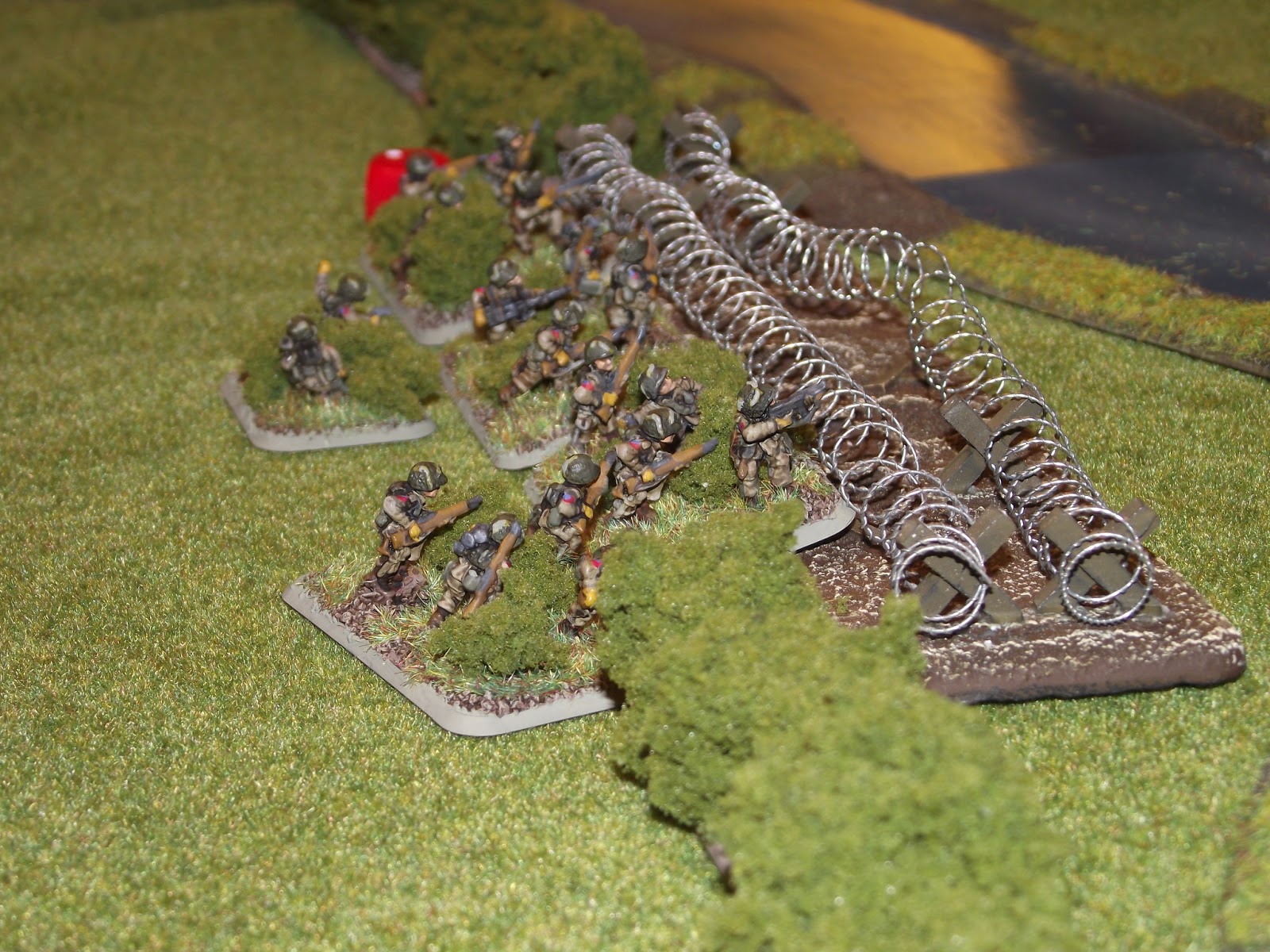  Paras tied up on the barbed wire. The Germans would pepper them with MG fire and force them back. 