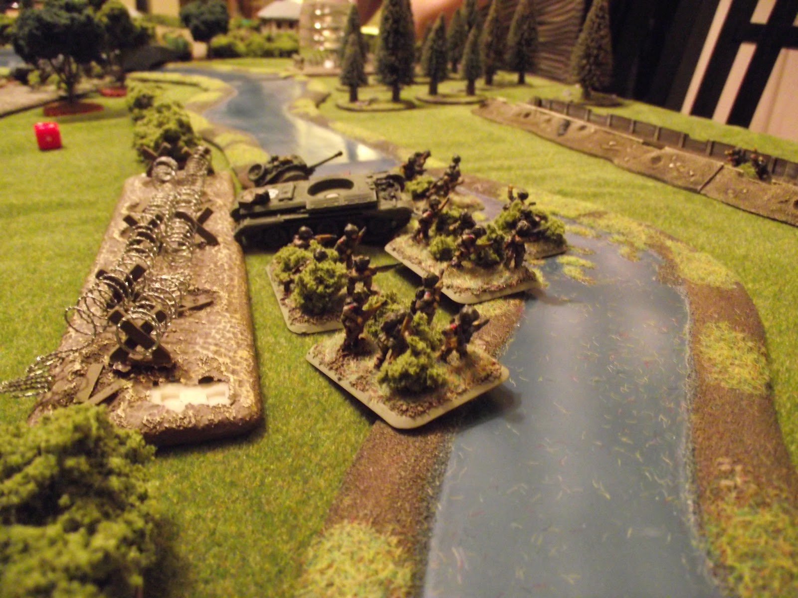  The Paras try to avenge its loss. They cross the barbed wire and try and storm the trench. 