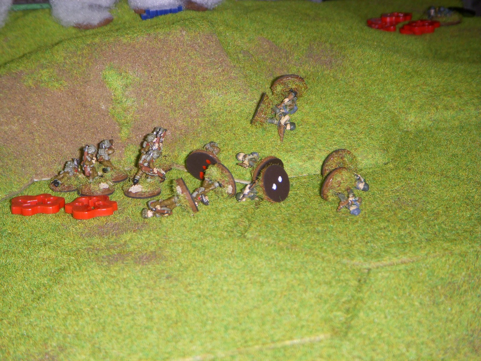 A German squad tries to hit the isolated squad in close combat but are defeated with heavy losses. The attack does make 1st Platoon combat ineffective.