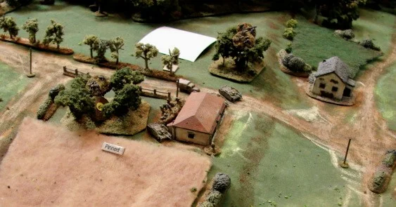 Germans taking hits Meanwhile the truck with the Pioneers has dashed towards the bridge. The German Big Man heads to the orchard to rally the hurting squad.