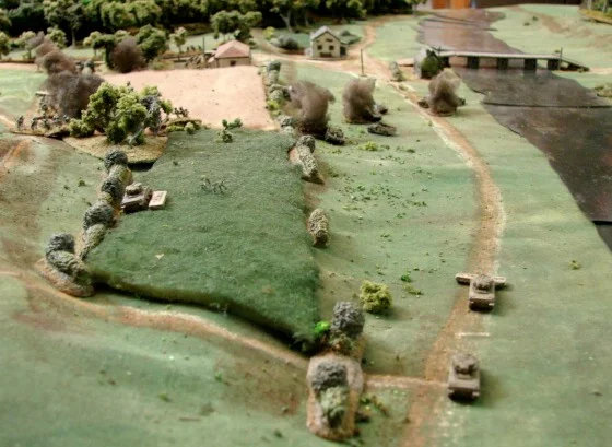 Smoking vehicles everywhere Three T-34s, eight M4s, five M3 scout cars, three StuG IIIs and a Marder are casualties