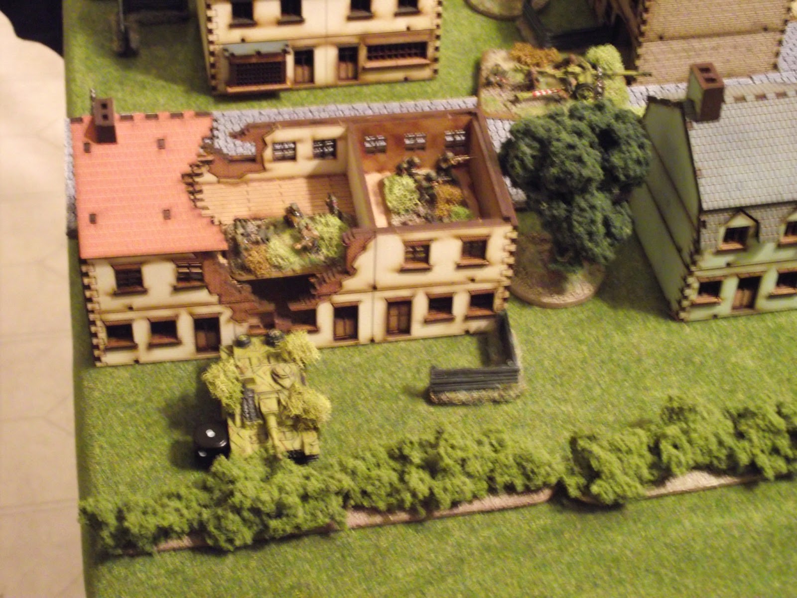   1st squad of 1st platoon retreats all the way to the town and enters this building to set up what defence they can.  