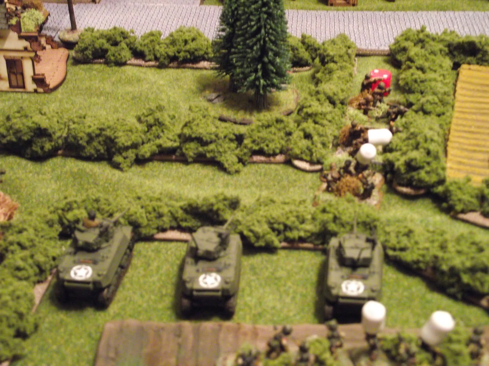   Stuarts wont be stopped though, and lay into some Germans with a flank shot using HE.... 4 Germans dead.  