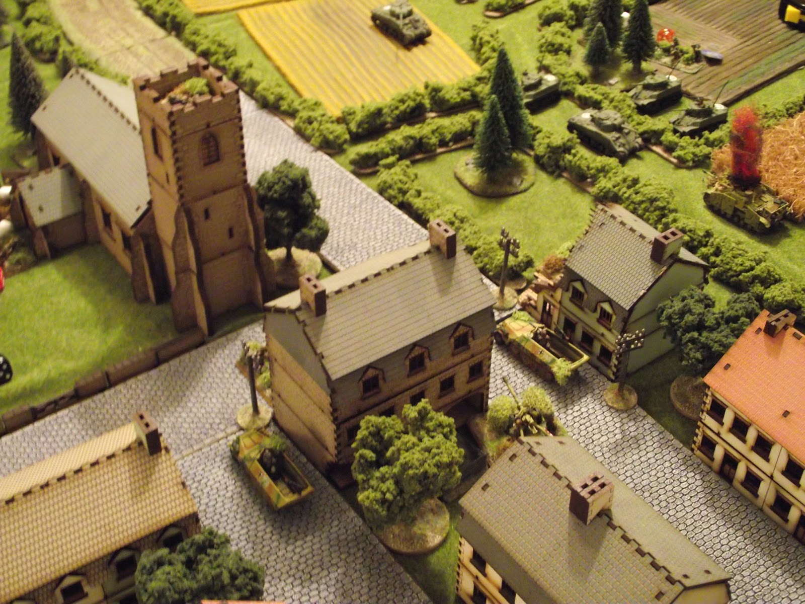   Another German squad enters the Hotel across from the church and sets up on the second floor.  