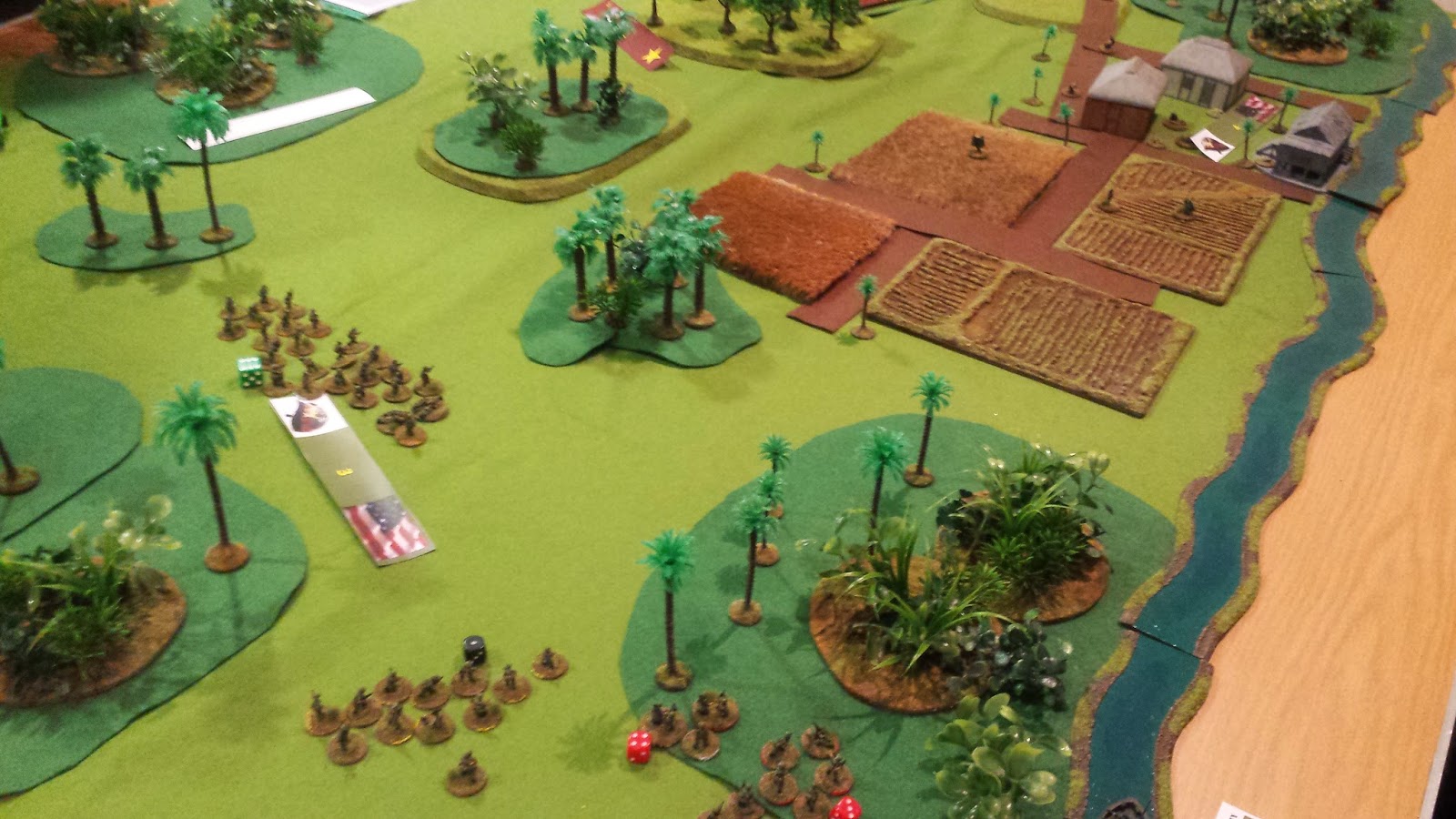 The US forces to the left of the table, where they spent most of the game under heavy MG fire from the troops hidden in the jungle at the top edge.