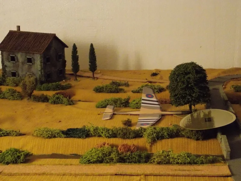 On the "Glider Landing" card the Horsa fails to stop and hits the tree by the bridge. The plan to land between the waterways is almost a disaster. Using the Stonk table, 15 Pl loses one dead and amasses 12 shock within the platoon. It gets out unspotted.