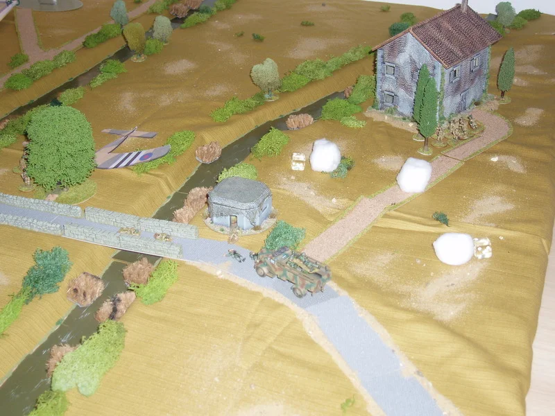 Lt Withers also directs the 2" to use its limited smoke rounds to protect his other section returning from the farmhouse.