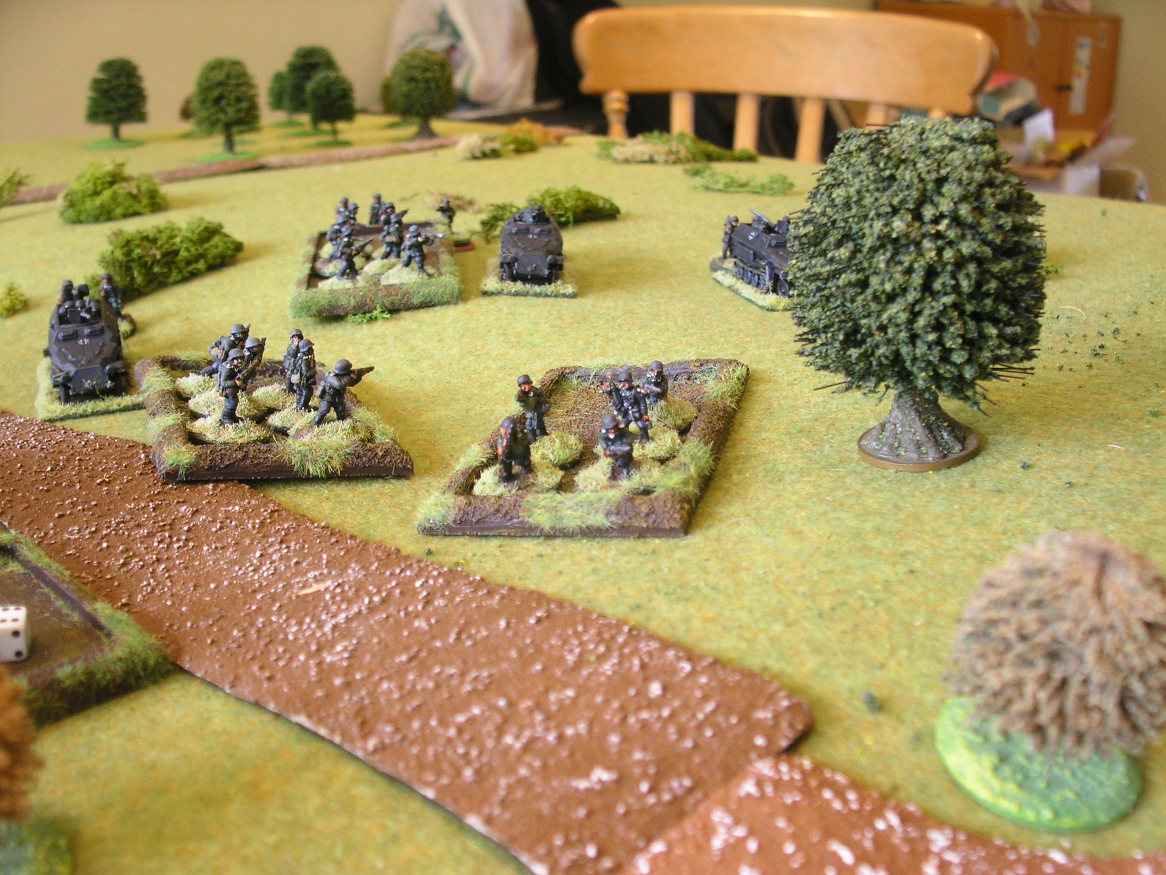 Before: down the hill go the German infantry