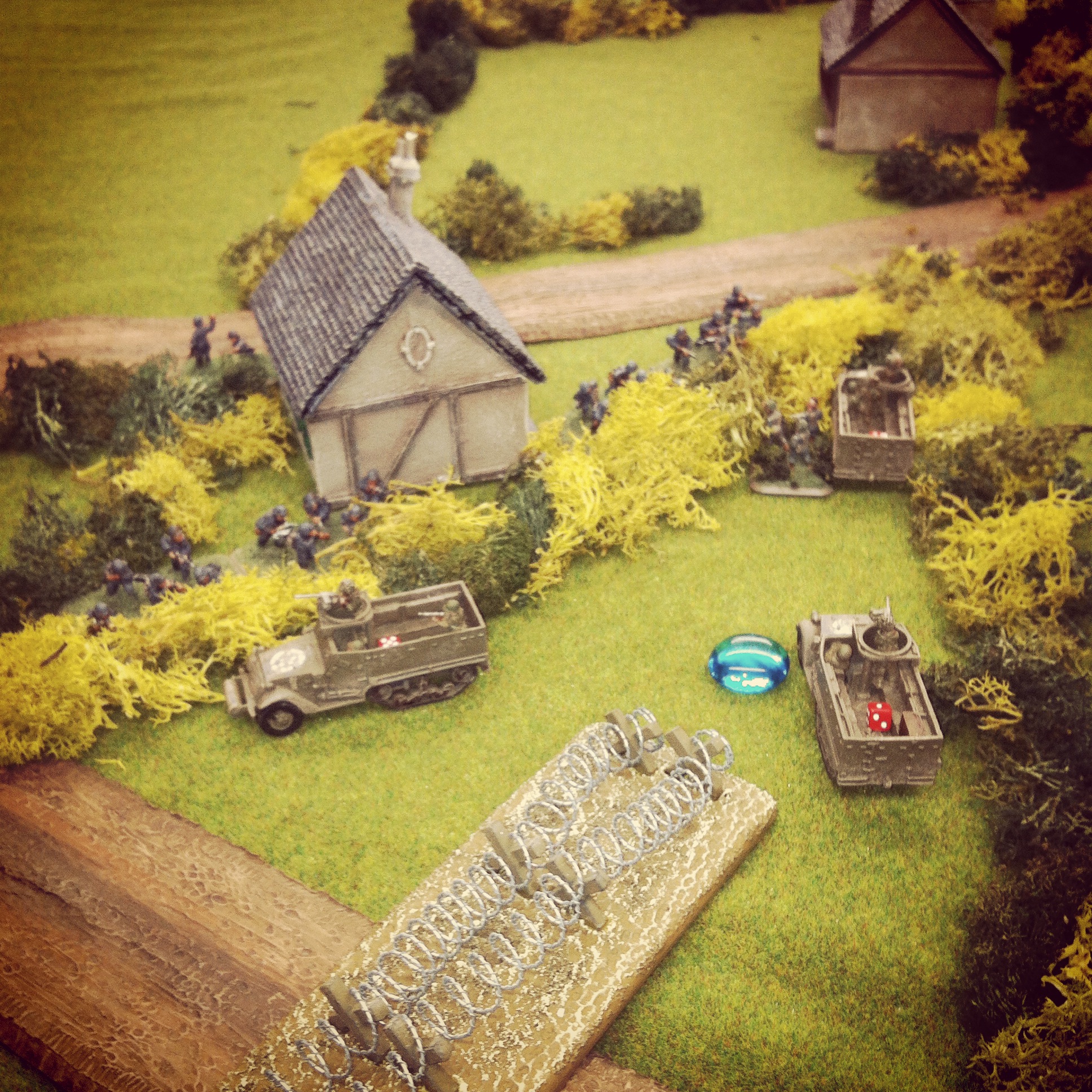  German infantry move out of the house to engage the US infantry