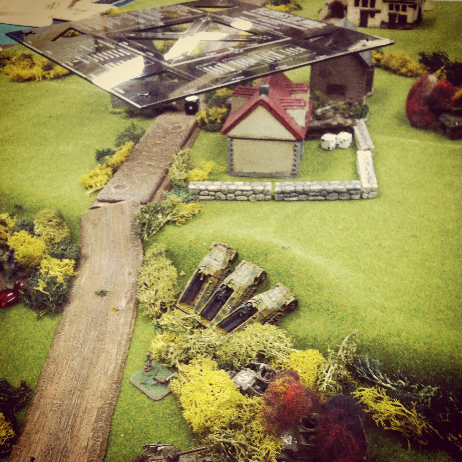 Flares illuminate the town objectives and German mechanized Grenadiers push forward