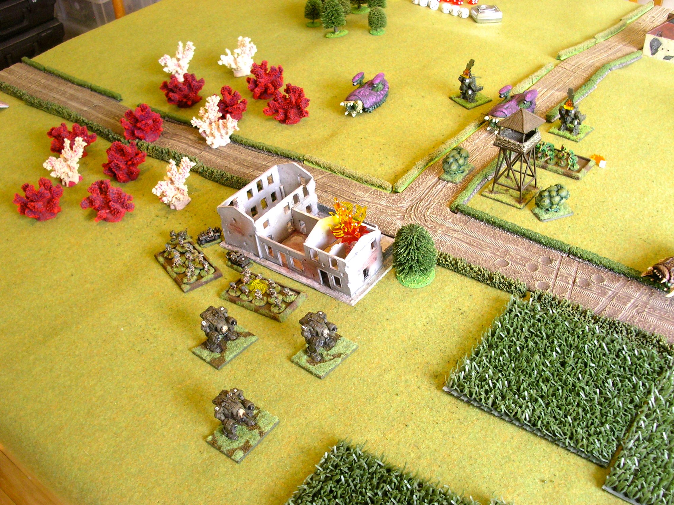 airborne troops flee the flaming farm