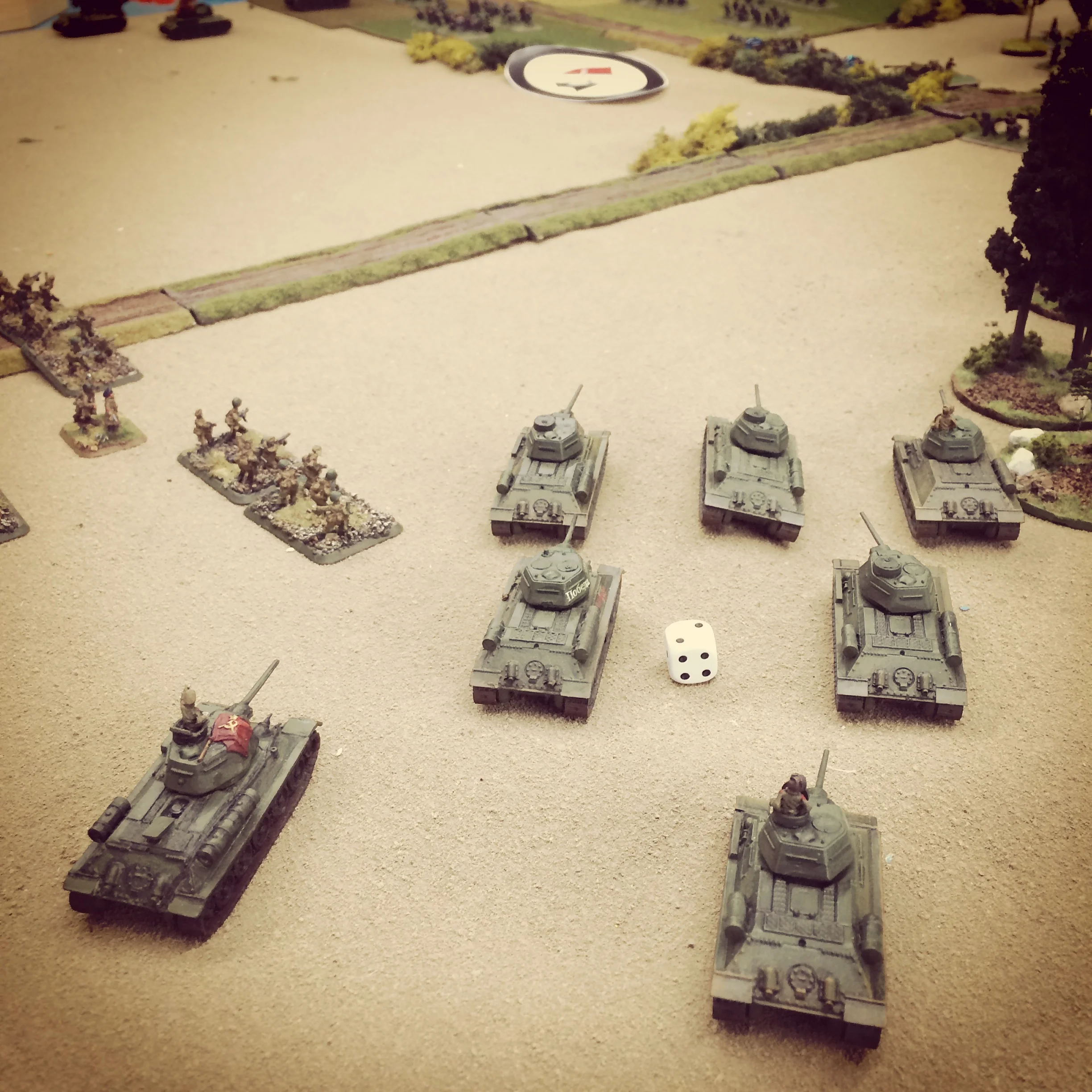 T-34s try to push from the right using the forest as cover