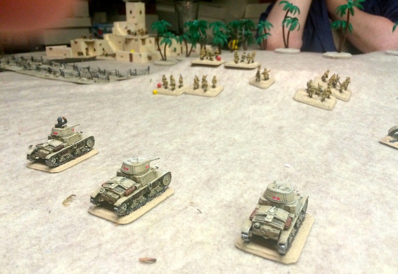 Here my fearless Italians advance on the British left flank, after taking out an unfortunate pair of 2pdr ATGs with a barrage of HE tank fire. Everyone’s had their double espresso and almond biscotti and are feeling molto avanti.
