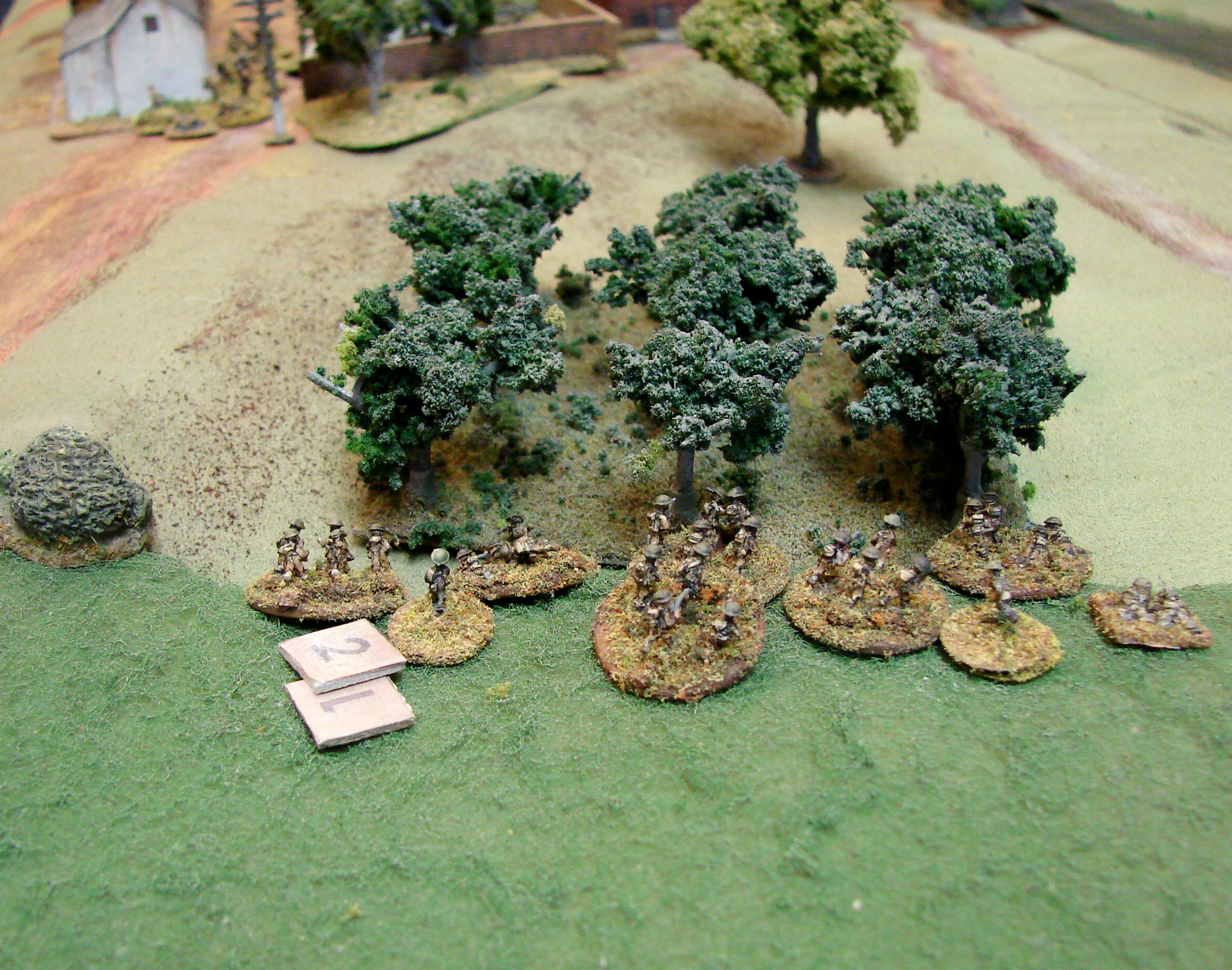 Pinned down infantry The second SS platoon is just too much for the already banged up platoon to handle and they prepare to move back down into the stream bed.
