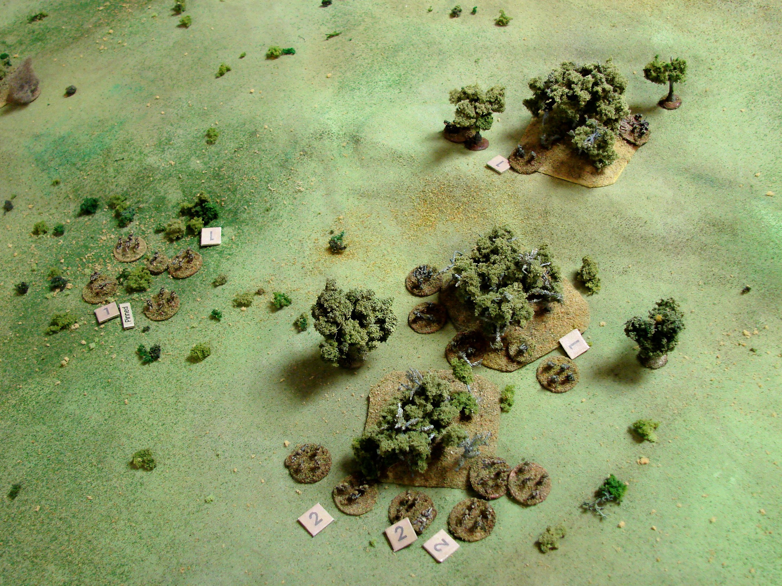 More Russians Stymied After getting some scrub on the slope the two Russian squads are chewed up and their CO also killed by a MMG team.