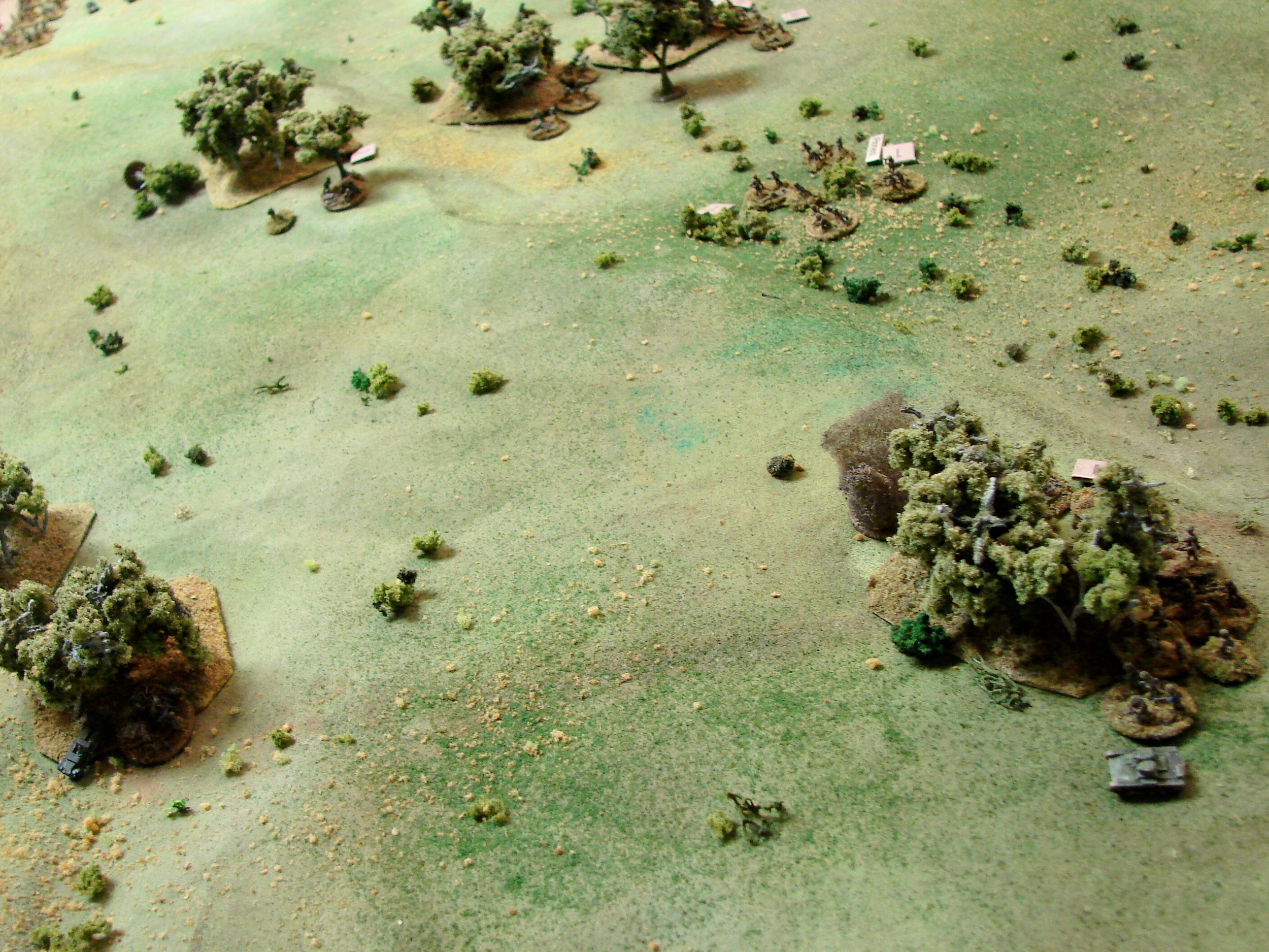 Face off between Pak38 & T26 The Pak misses its first shot and the twin MG tank returns fire taking out half the crew, but the next shot blows the T26 up. The Red infantry in the trees will overrun the ATG in the next couple of turns.
