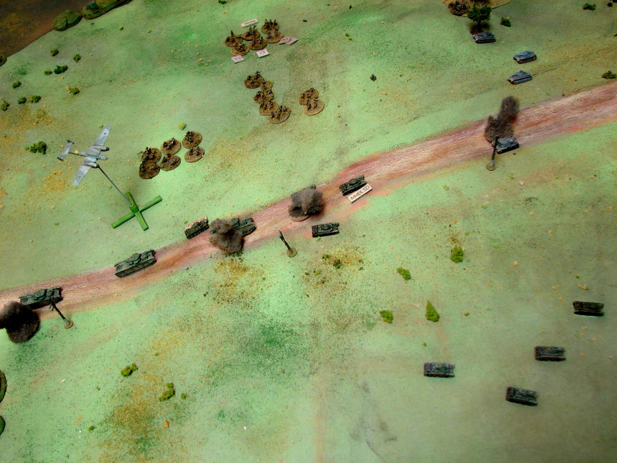 Can't outrun the Luftwaffe The remaining BT7s decide to go to the right and use the cover of the slope to avoid the Panzers they know are on the ridge. But the ever present air support stills catches the tanks and forces another to bail.