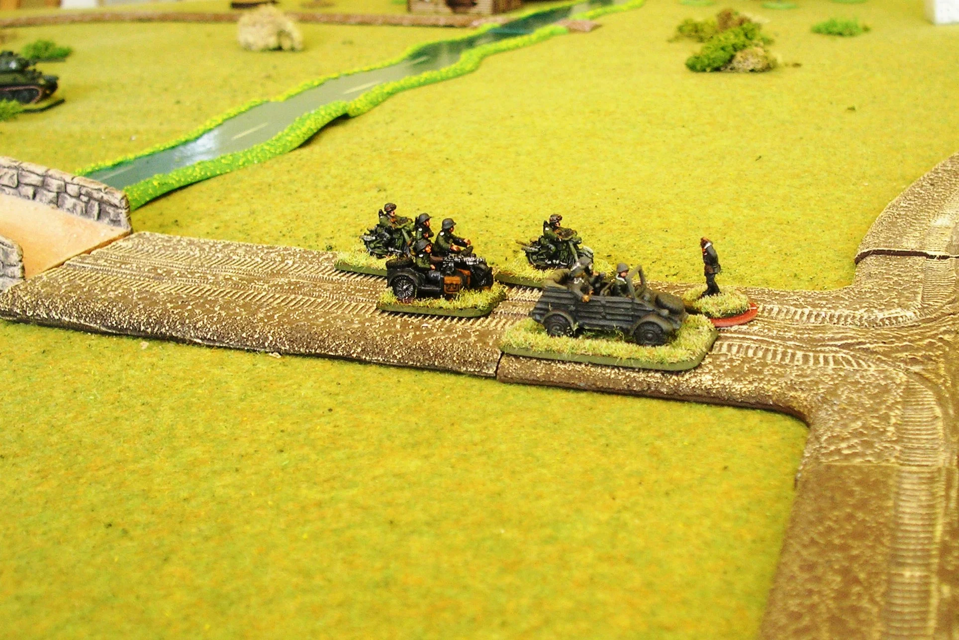 german motorcycles beat a hasty retreat in the face of russian armour, and encounter an unamused officer coming the other way