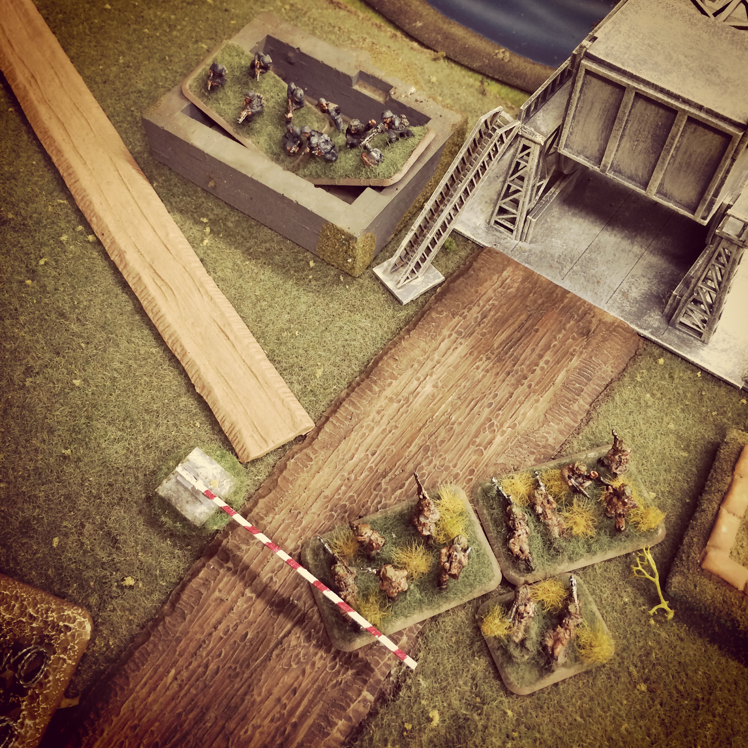 A British fire team splits off to attack the German bunker
