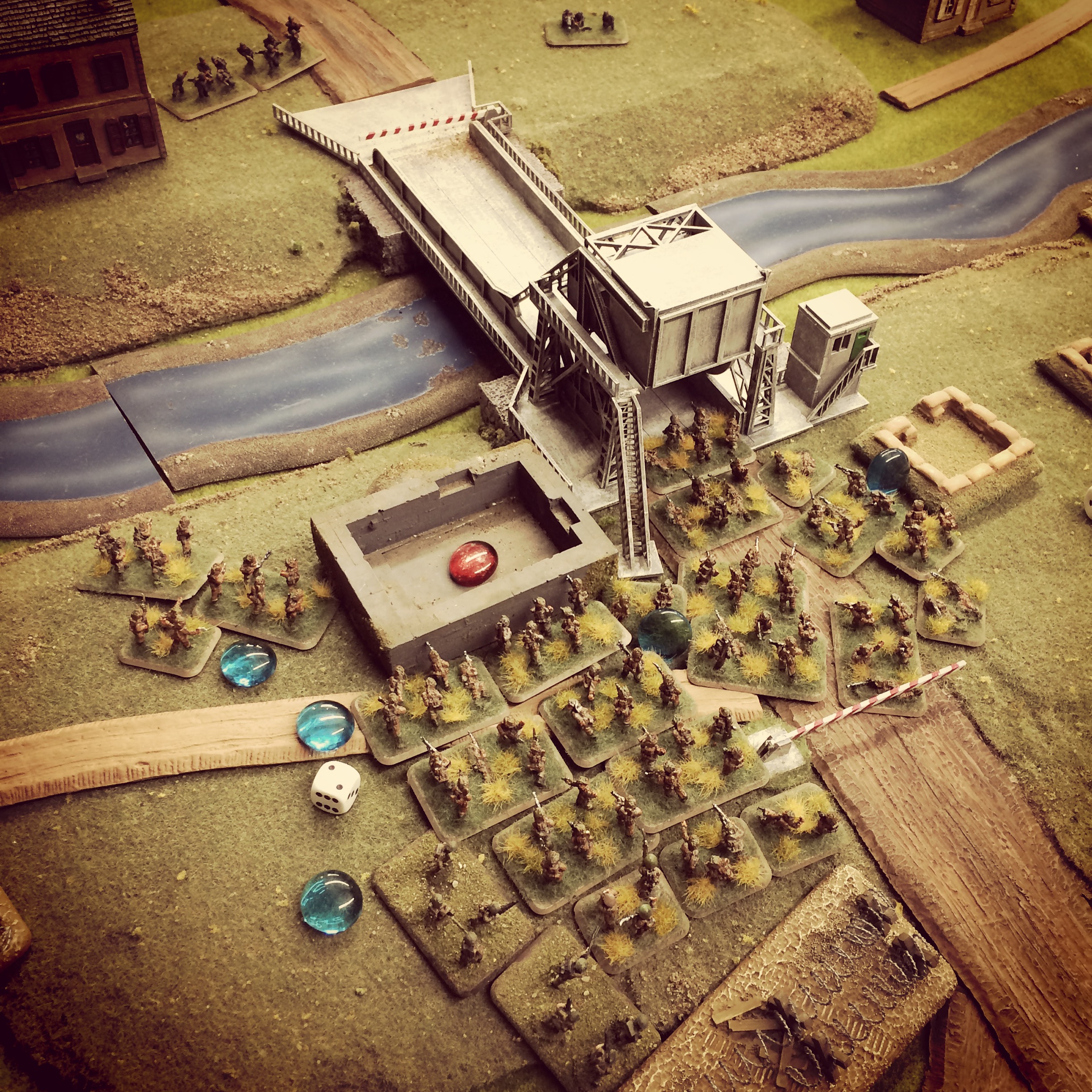 British engineers set charges at the bunker as German machine guns open fire across the canal