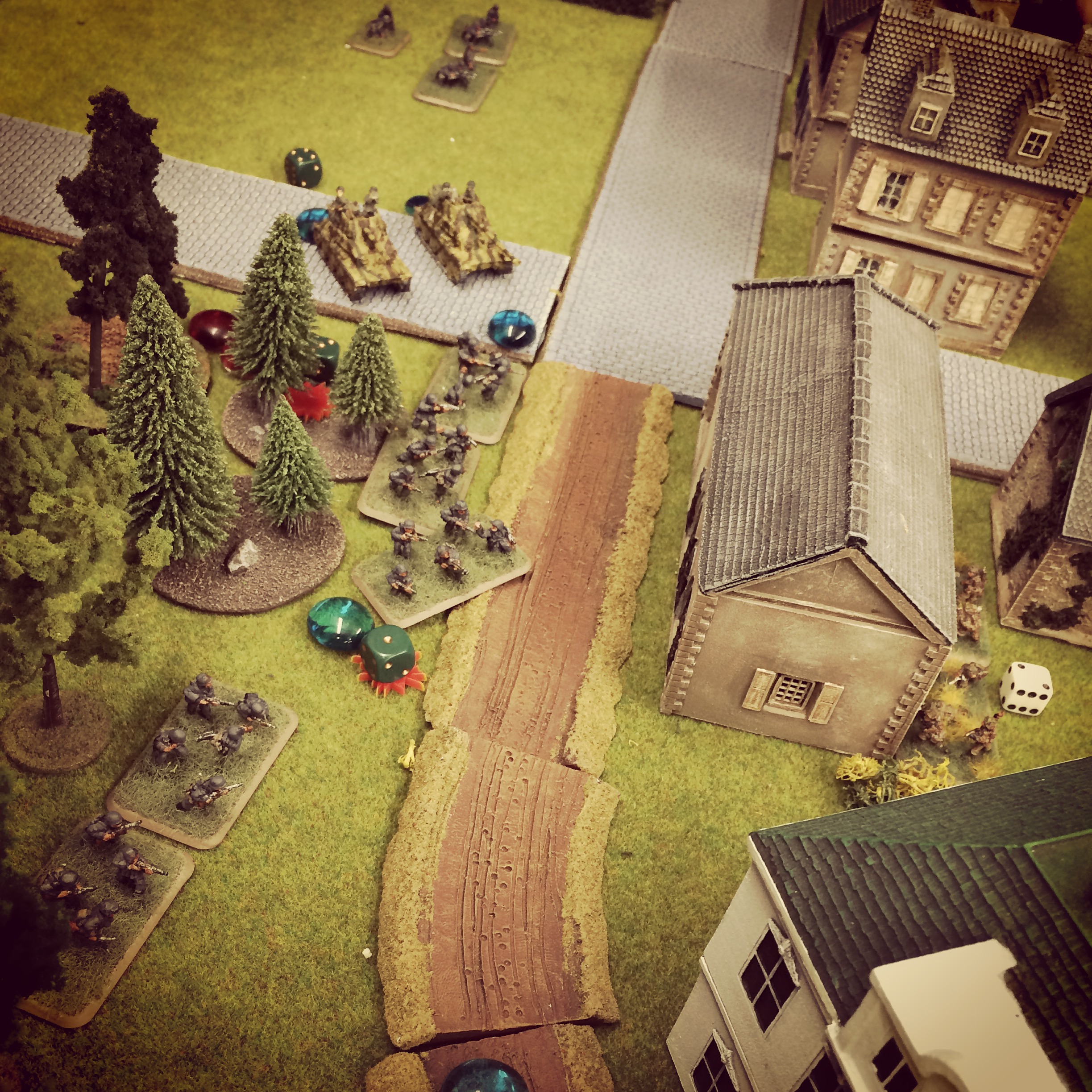 German troops advance on the town supported by mobile guns