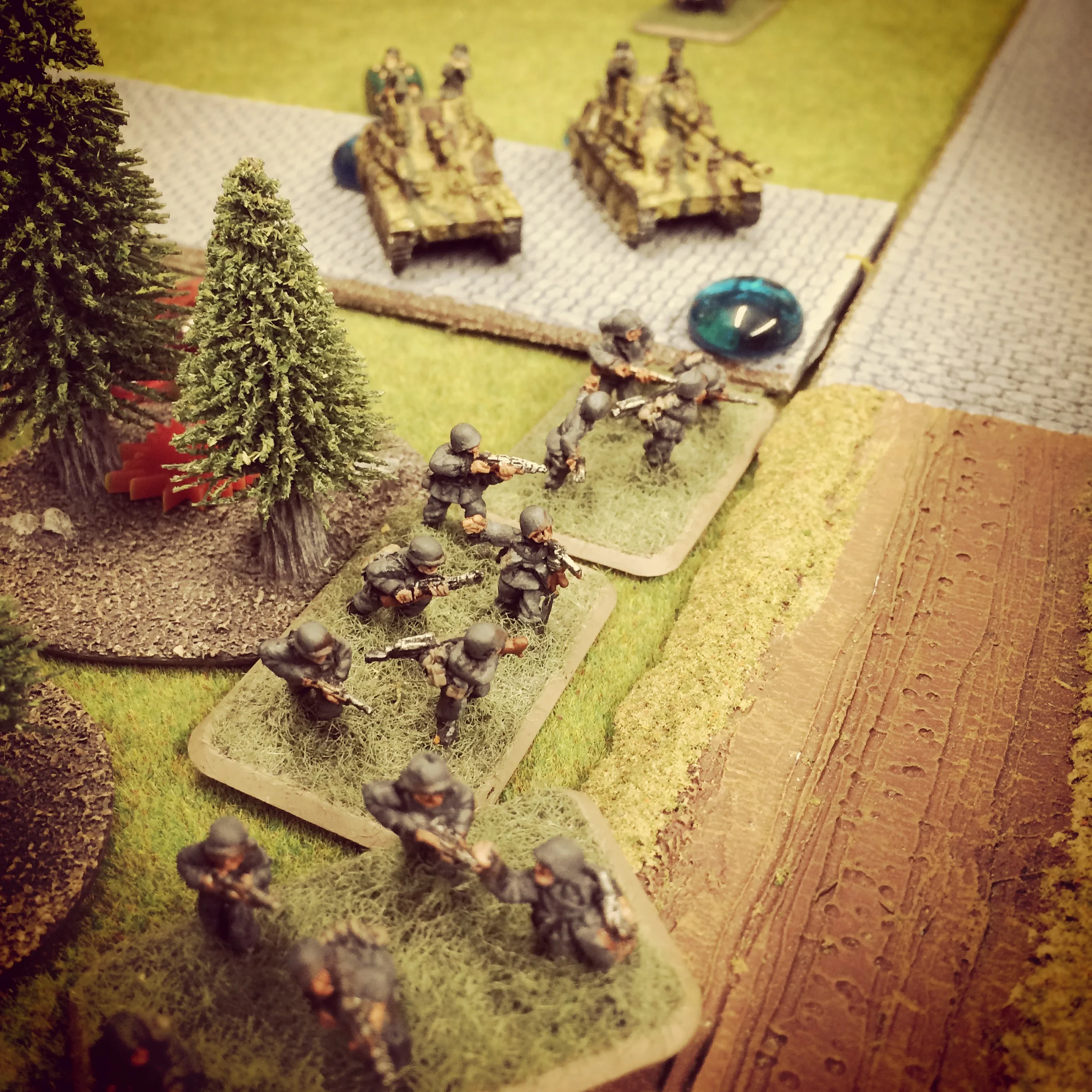 Germans swarm out of the woods toward the British defenders