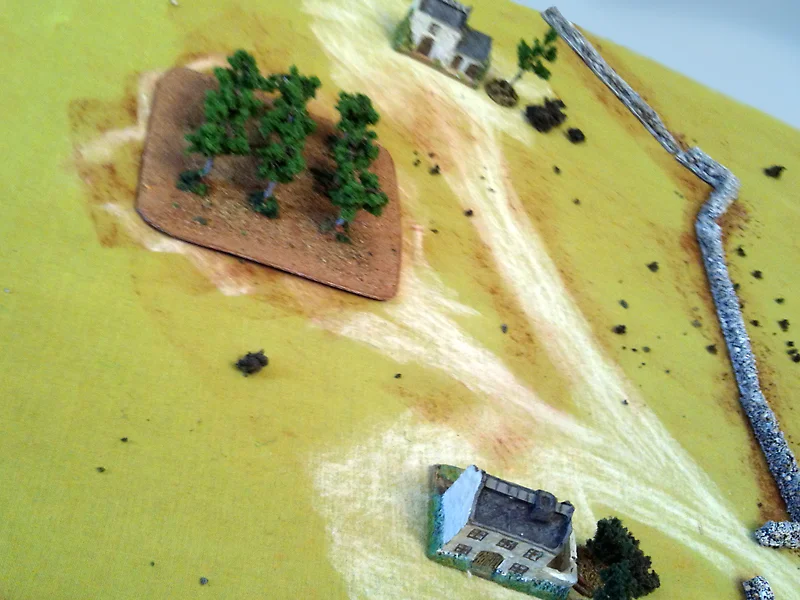 Two farm houses in the south-west corner of the table. But there were indeed too far from the main actions.