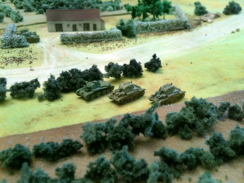 Meanwhile an A13 and two A9s fire HE at the MG34s positions. The Germans had heavy casualties because of it. Note from Lardy Chris: As a minor point, the A9s and A13s probably shouldn't have HE for their 2lber's. Only the CS versions would have any HE and only in very limited quantities since they were primarily intended to provide smoke support. Vaggelis' response: You are absolutely right Chris! I made this serious mistake in the heat of the...battle. Thanks for the careful reading of my report!