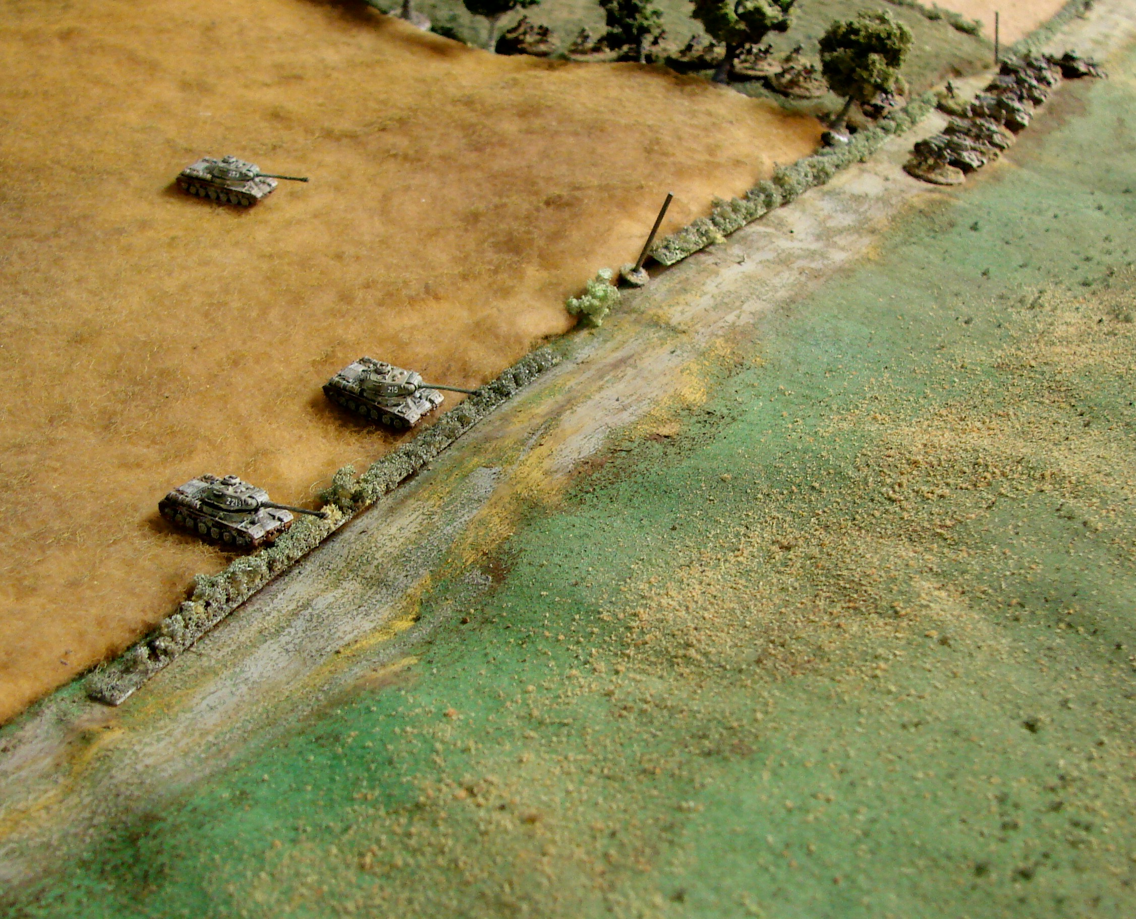 IS2s Moving Up The heavies move up the center of the table directly towards the hill objective.