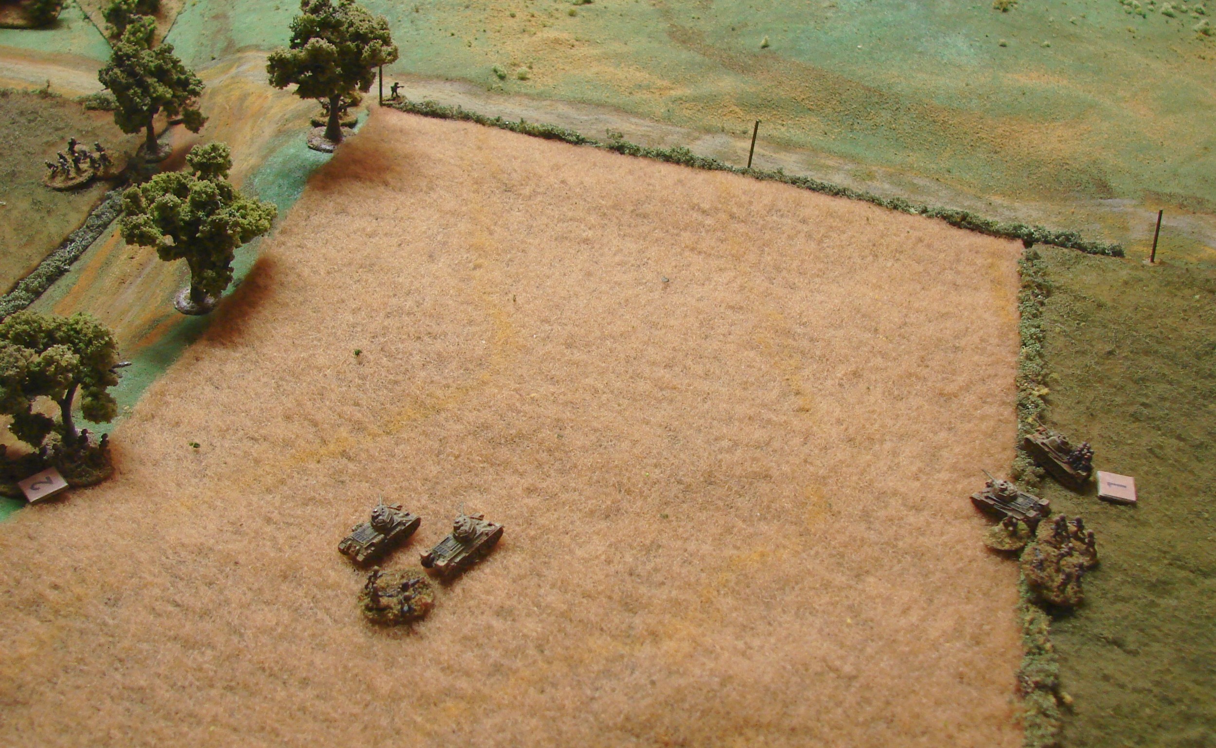 Cleaning Off The Infantry The right side grenadier platoon opens up with their LMGs and gets some nice hits on the 'great' target of infantry clinging to the sides of the T-34s