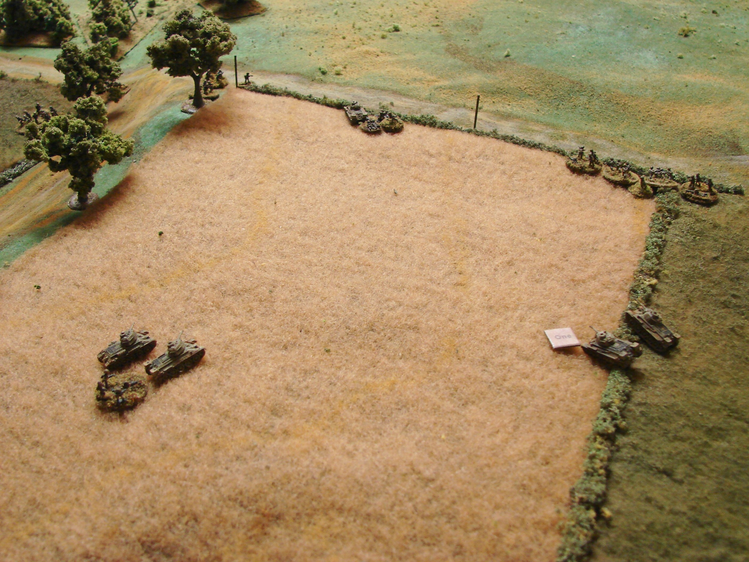 Half of the T-34/76s Four of the eight T-34s with tank riders coming under fire from Stugs, Sdkfz 250/9 and LMGs from the grenadiers along the intersection.