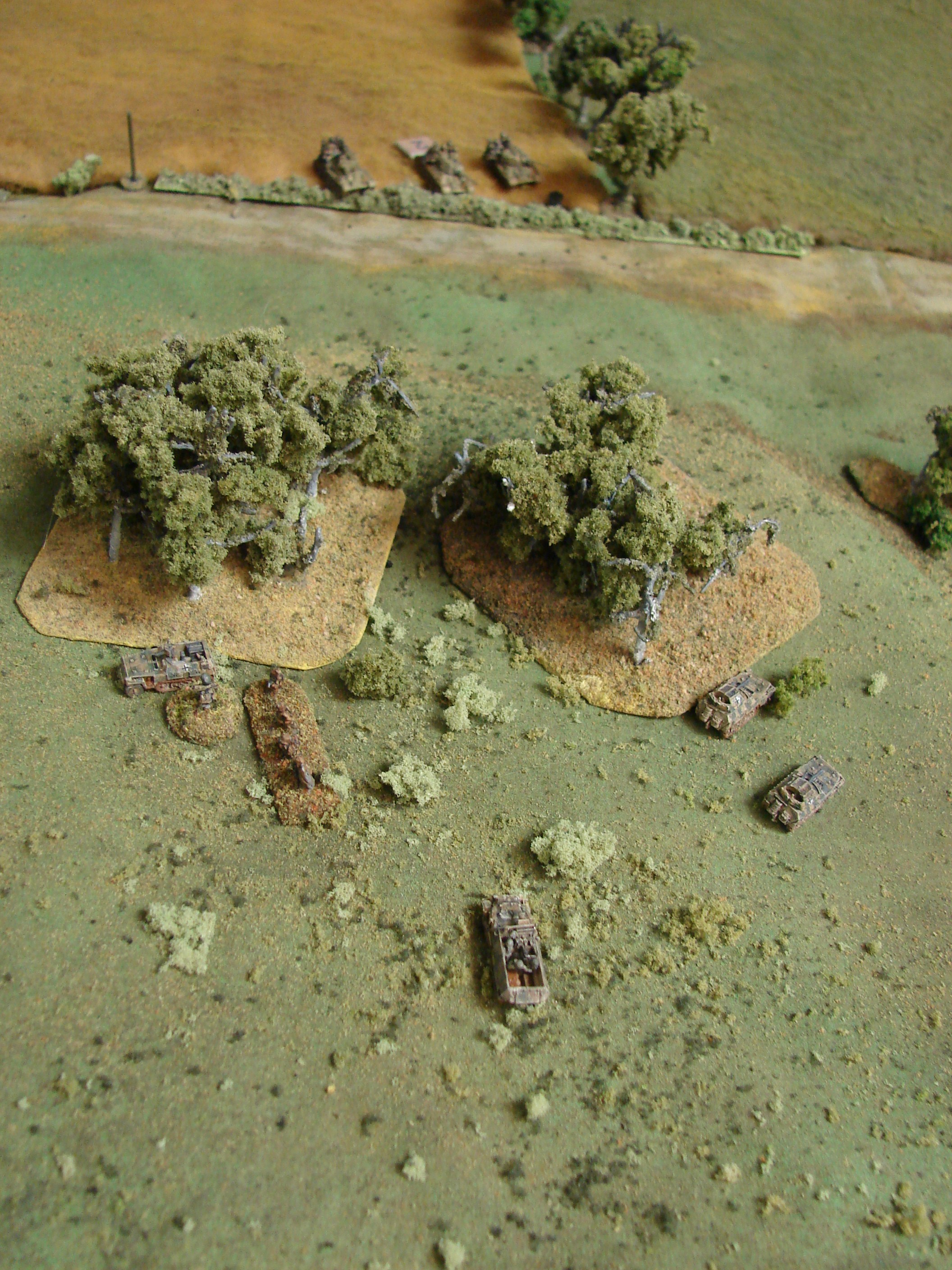 Stummel fires and retreats The T34s are too close for comfort so the HQ group shoots and scoots. This allows the Russians to occupy the woods shortly.