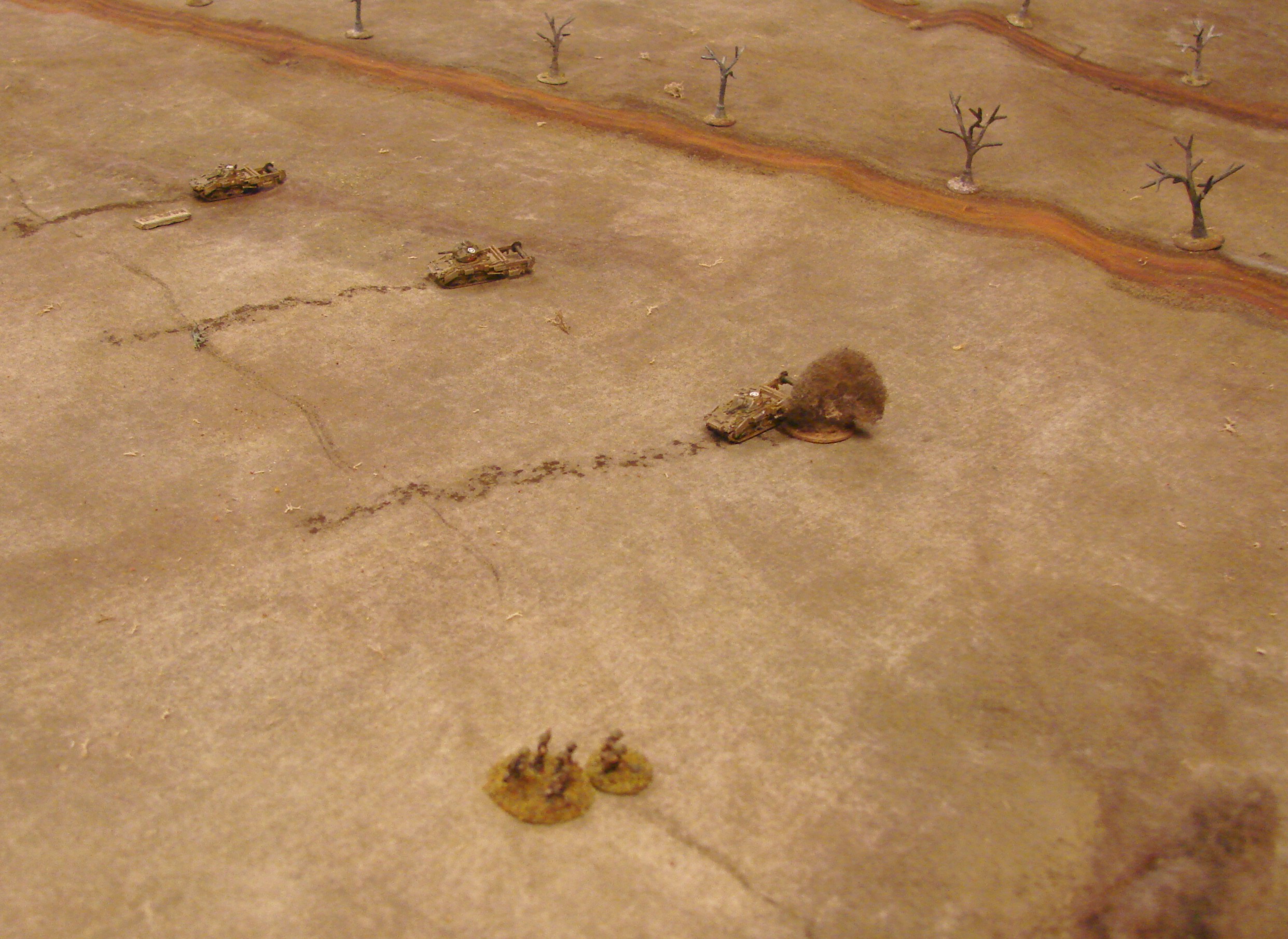 One Crab Shelled The rightmost Crab is destroyed by 88 fire from across the Maas. The lefthand Crab has been temporarily immoblised by a Pak40 in the wood patch to its left front. They can clear up to a D4 worth of mines per turn.