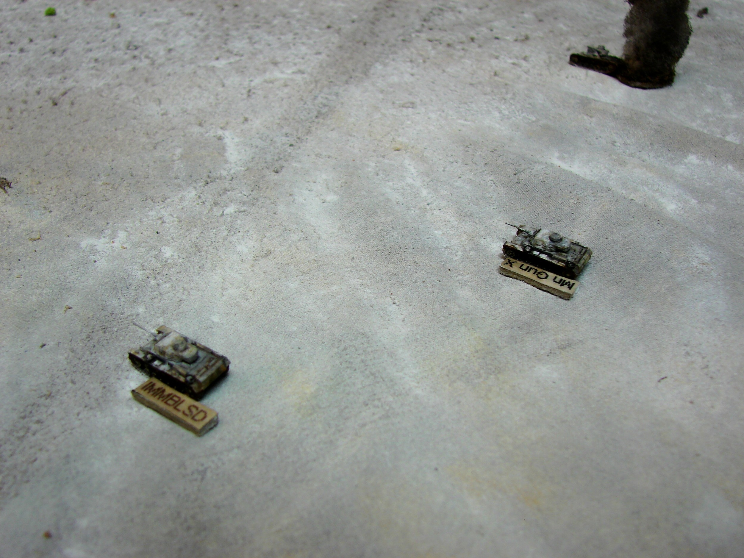 Damaged PzIIIs Both of the PzIIILs are now out of the fight. Only one Tiger left to take on the Russian armor and the way the dice have been going for the panzers, that will not be enough to stop all the T-34s.