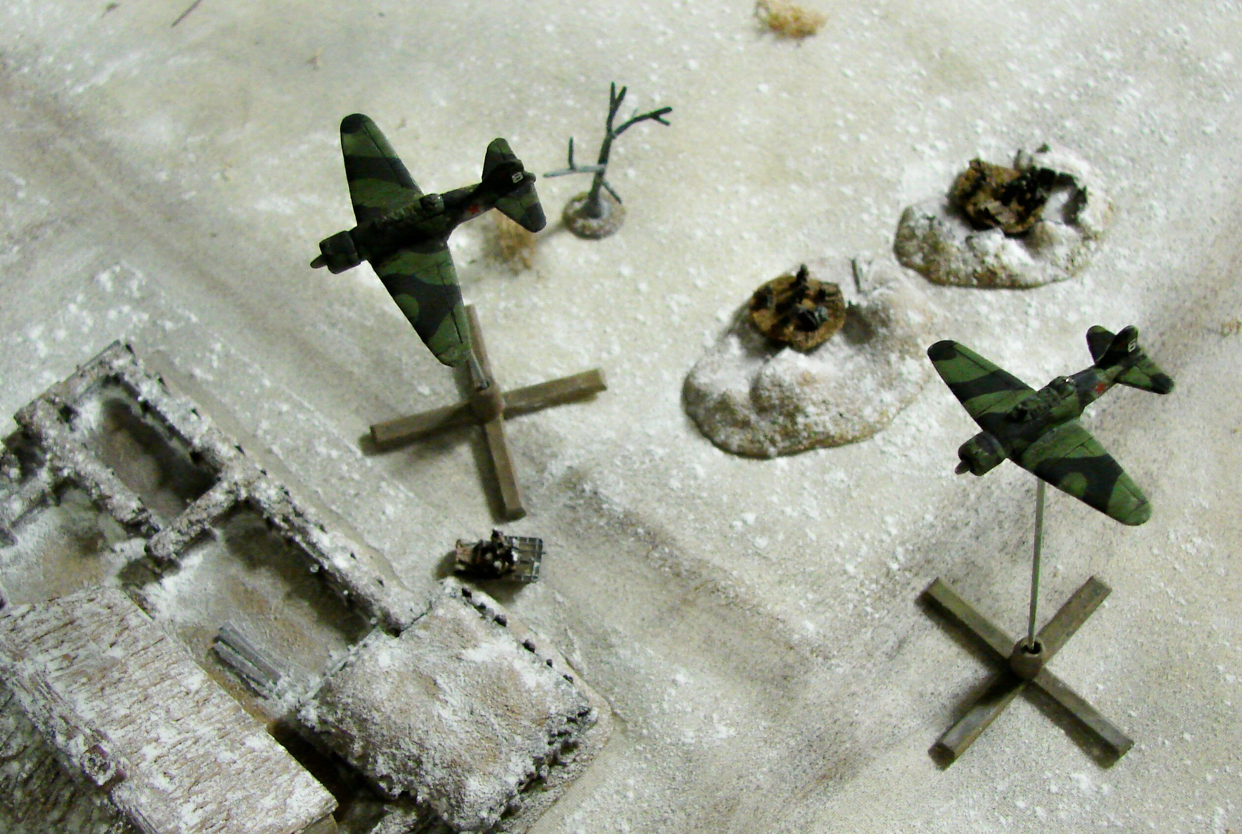 More SU-2s They make a second run on the entrenchments. This time on the main buildings. Wise choice (luck actually: we rolled for their target) since their bombs fall so far from the target they would probably have hit their own troops if they were going after the other position.