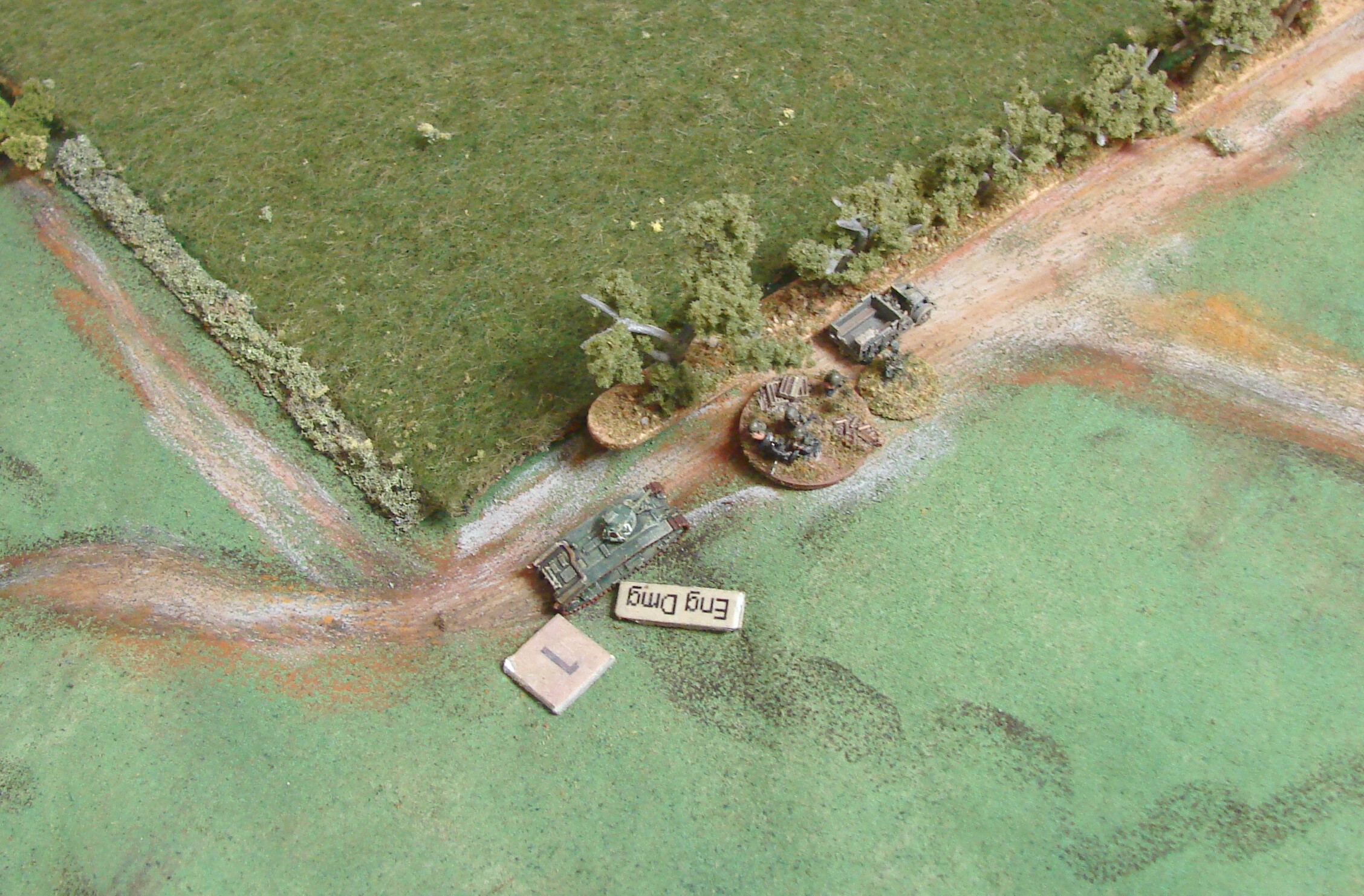 Charging the Pak I decided early on not to sit back and try to take out the Pak with fire but to run them down if they were in short range. Since they would probably not fire until the tanks were in close range, they would only get a couple of chances to stop the tank from crushing them. The Char comes up short though and it looks like the Pak might get away.