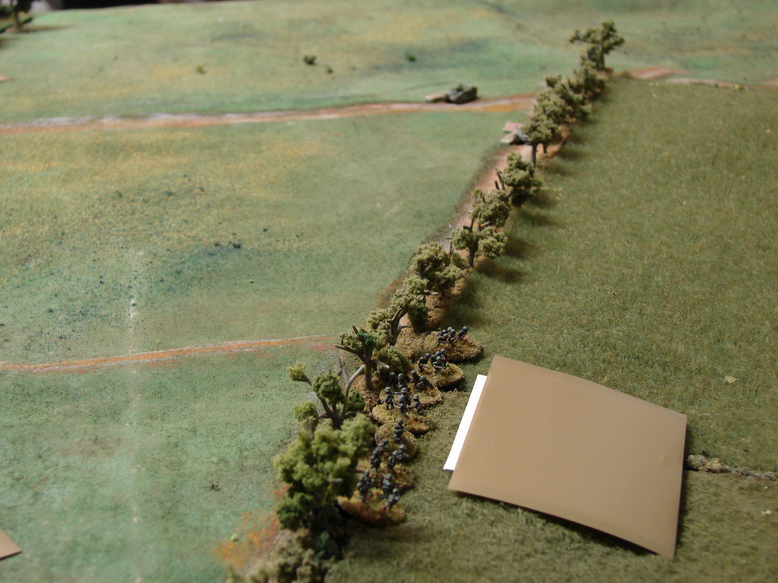 More Germans in hiding There is an Infantry gun under that blind next to the Grenadiers. Just waiting for a point blank side shot.