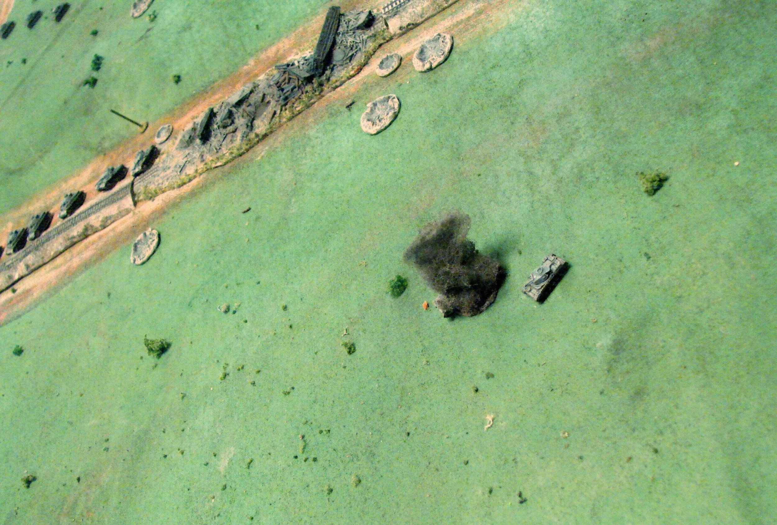 Pz II destroyed The two Pz IIs attempt to get arund the side of the buildings where the T26s are lurking, but one is blasted as it cross the open ground.