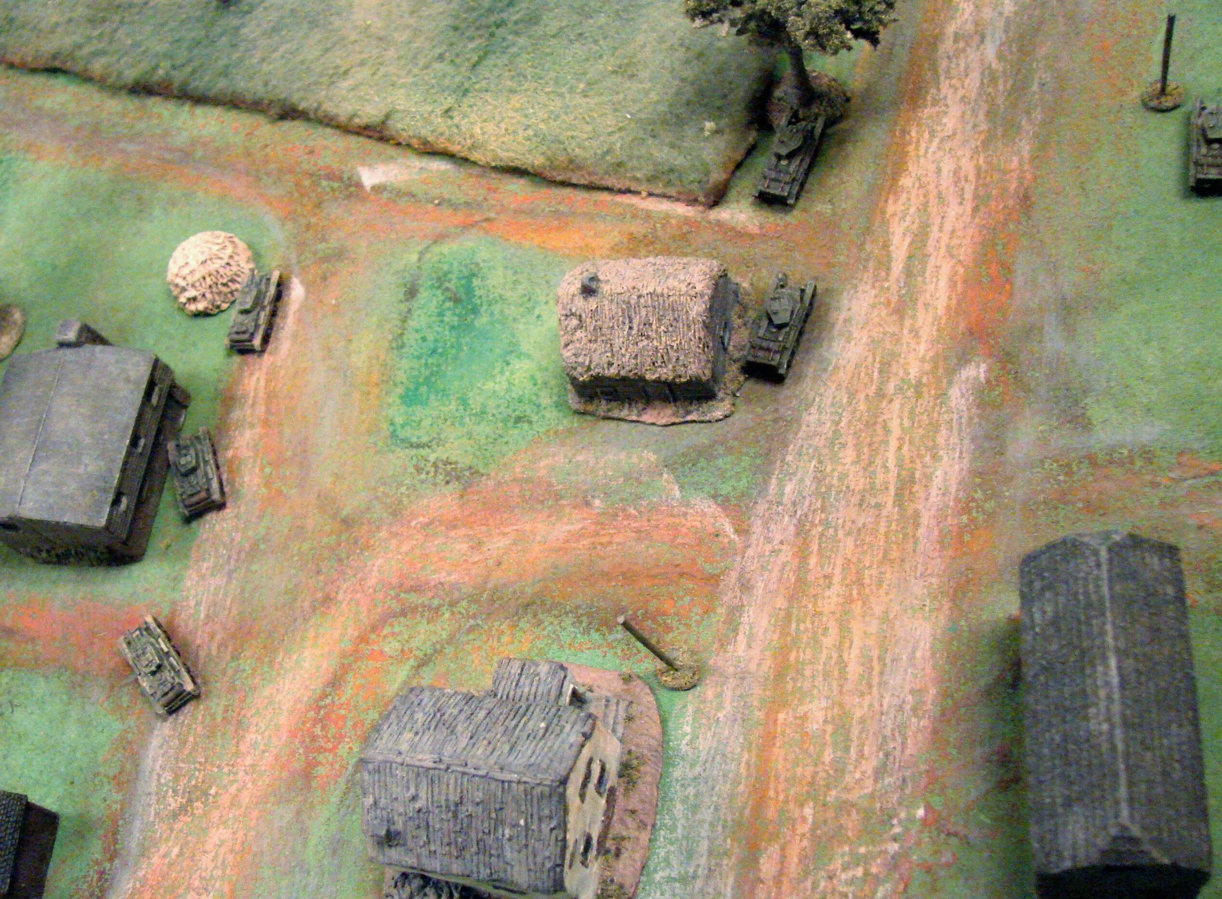Arrival of the 10th In lieu of not having enough models of T26s, the BT7s of the forward detachment of the 10th Tank Division comes on the table. Their arrival was dependent on the reinforcement card coming up six times after the Panzers were spotted.