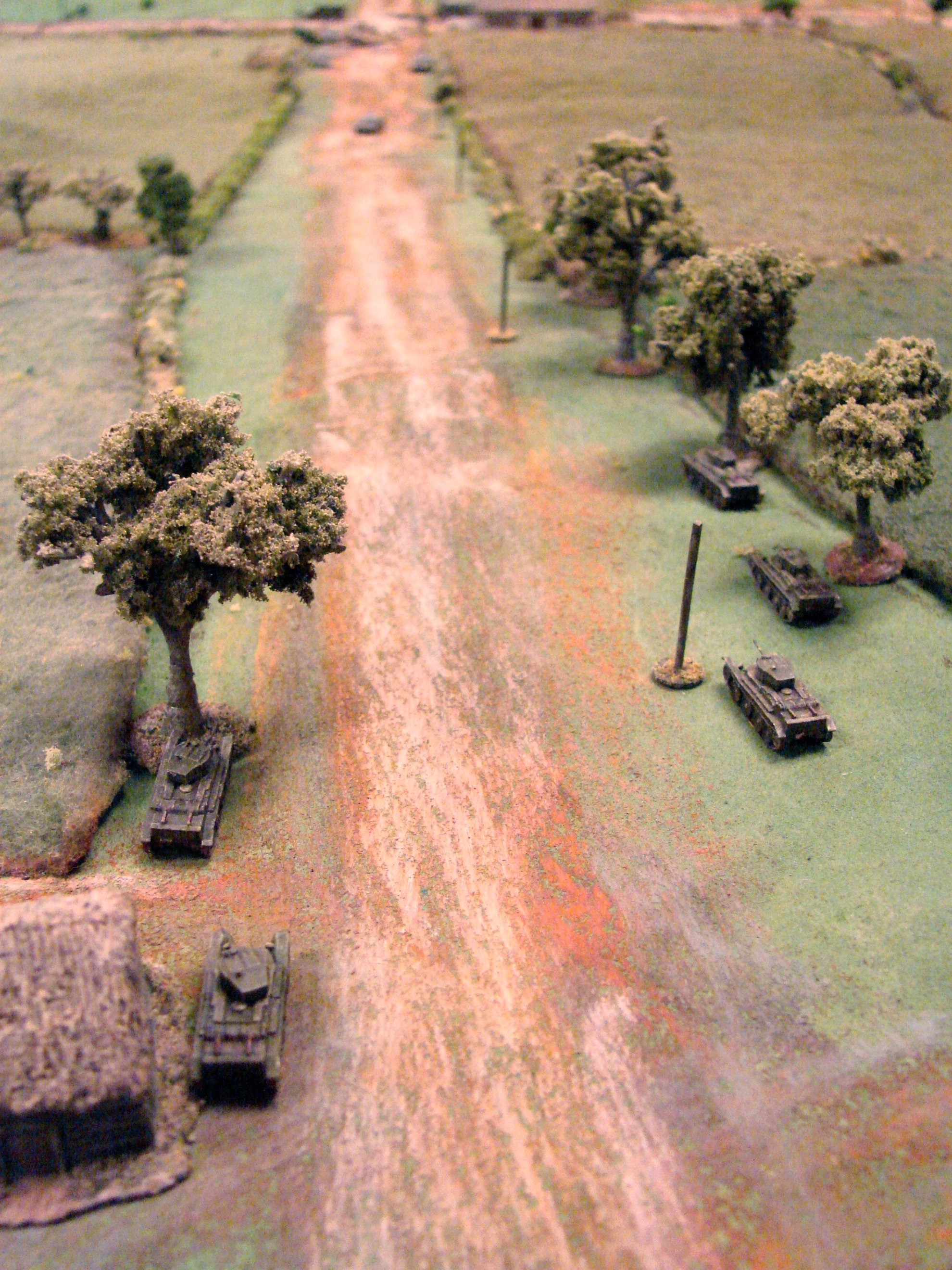 Showdown on Main Street The BTs see the panzers and move off to the sides of the road. This could be a nasty surprise for the panzers