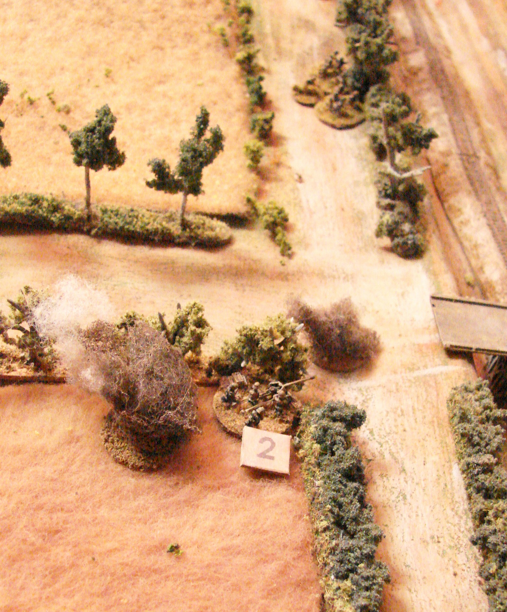 Pak under fire The three Shermans of the 2nd troop send some HE at the ATG.